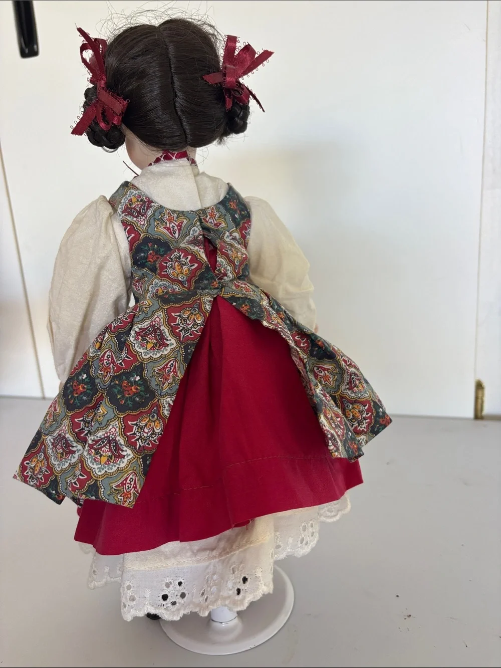 Collectible musical porcelain doll by Paradise Galleries or similar maker.
